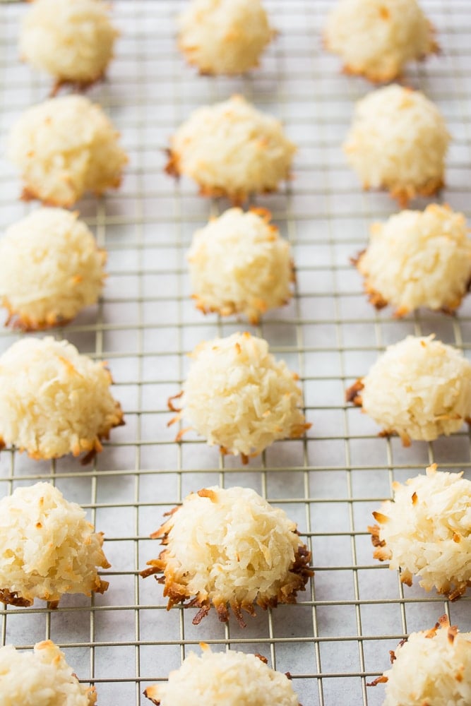 vegan coconut macaroons baked and on cooling sheet.