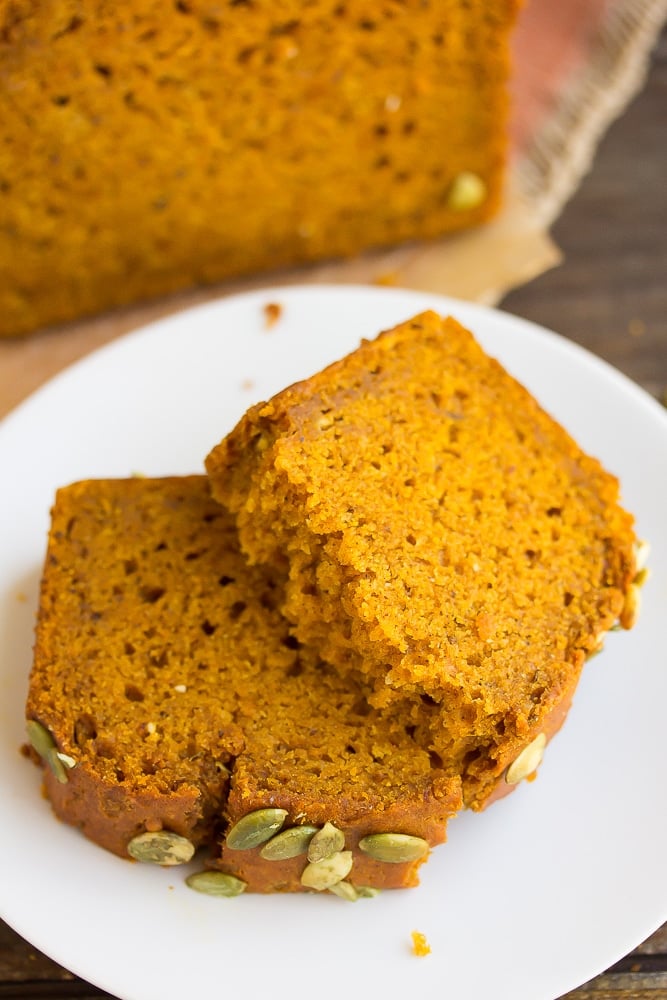 cut piece of vegan pumpkin bread showing texture