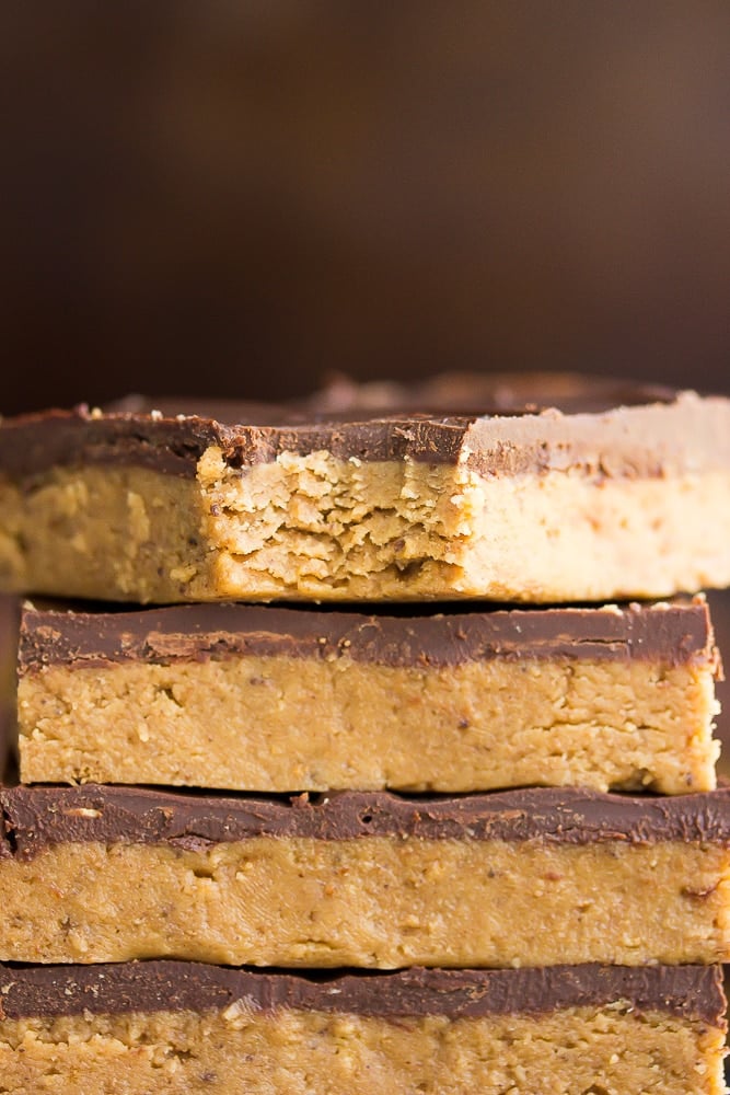 showing a close up bite of chocolate peanut butter bar