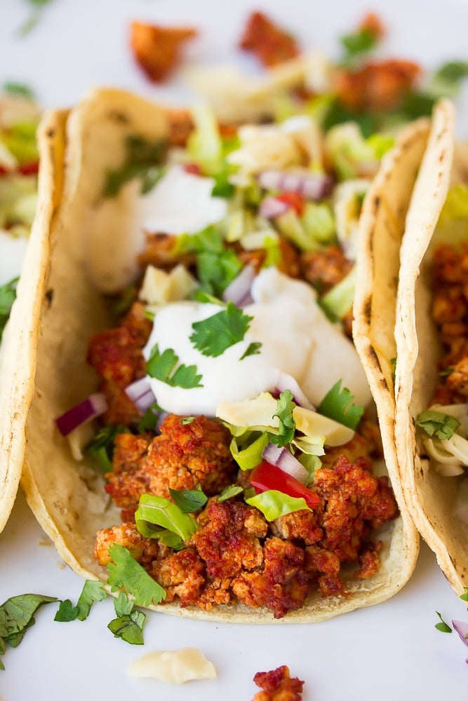 close up of vegan tacos, highlighting tofu meat