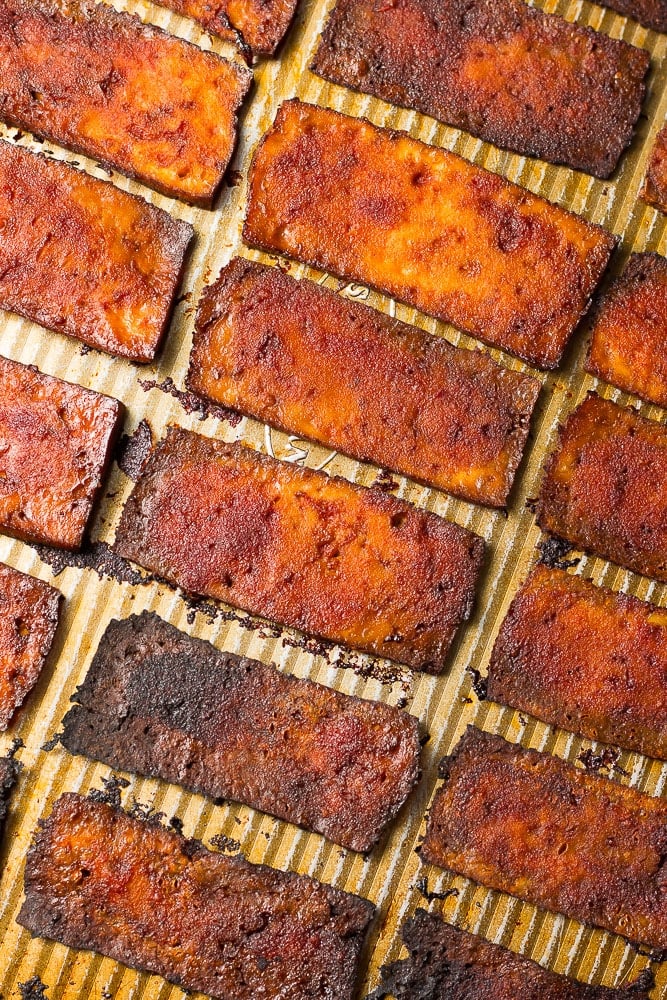 tofu bacon on the pan after being baked