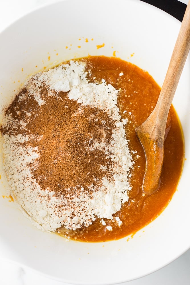 dry ingredients added to wet unstirred in a bowl with wet.