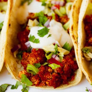 square image of a taco with meaty crumbles