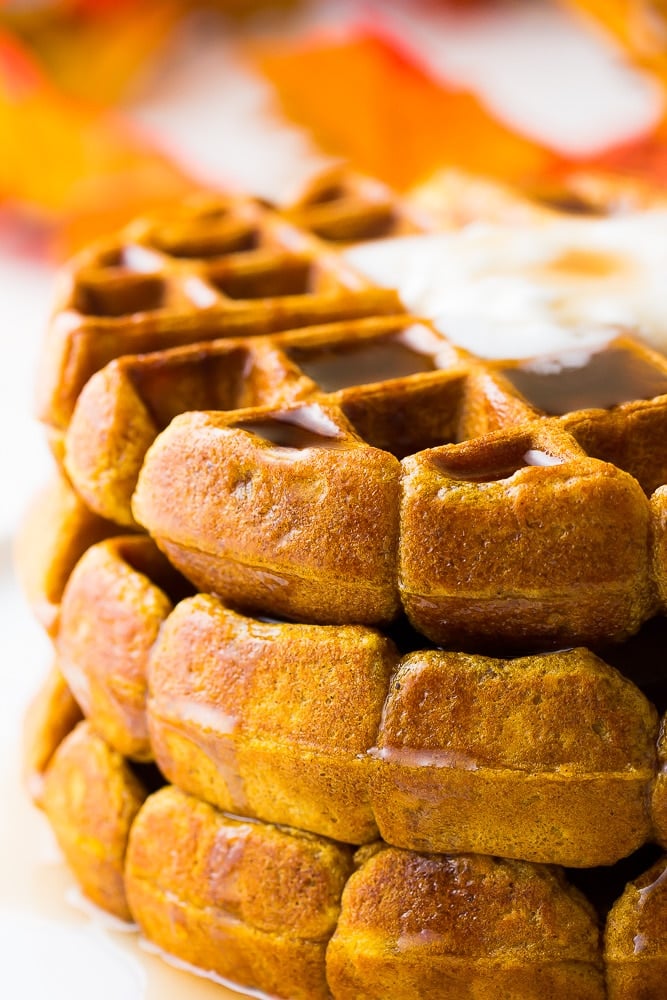 close up of vegan pumpkin waffles with cream