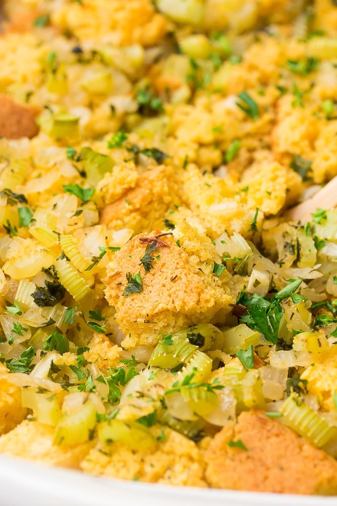 close up of vegan cornbread stuffing in a casserole dish