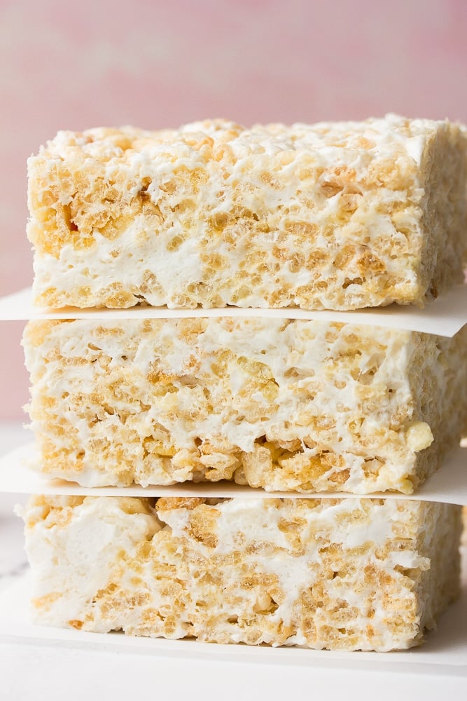 very close of shot of rice krispie treats and pink background