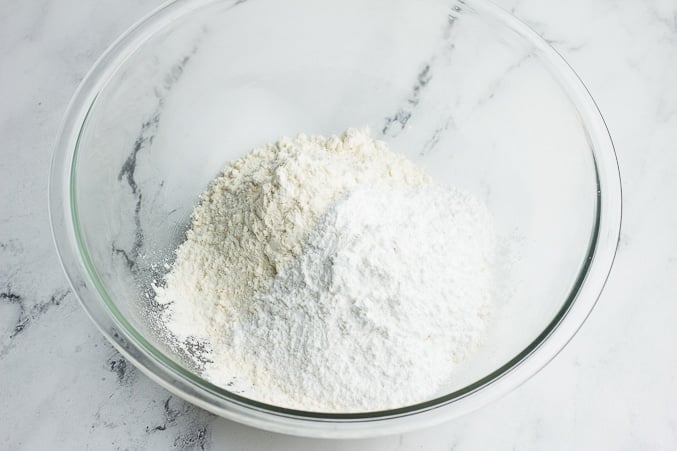 flour and powdered sugar in a bowl