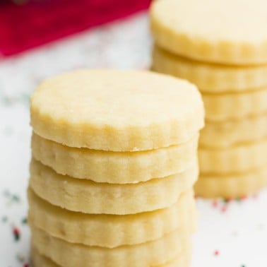 stacks of vegan shortbread cookies with red towel