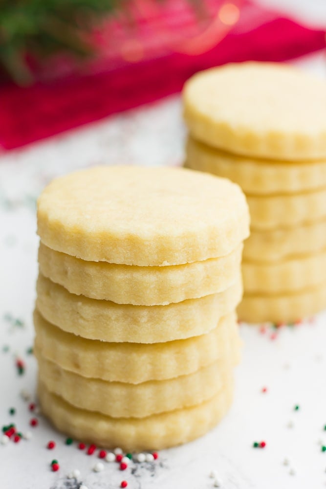 stacks of vegan shortbread cookies with red towel