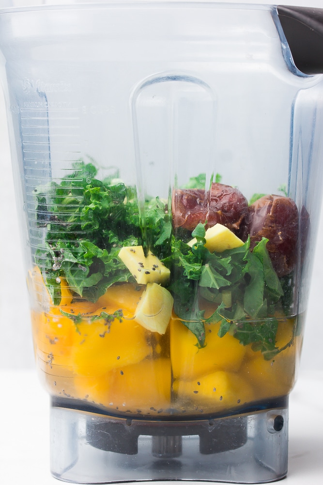 side shot of ingredients in blender for smoothie