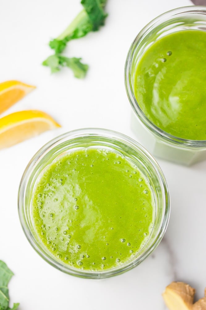 looking down on 2 cups of green smoothie