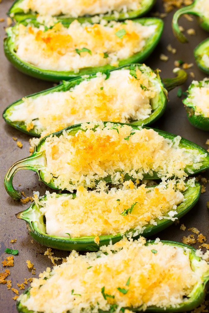 jalapeno poppers on a baking sheet