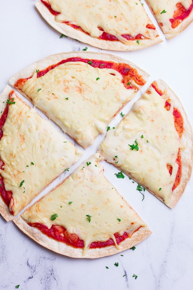 showing a whole pizza with cheese