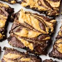 vegan peanut butter swirl brownies in a row