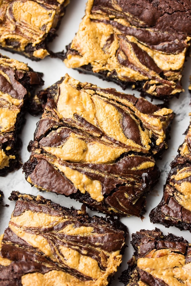 vegan peanut butter swirl brownies in a row