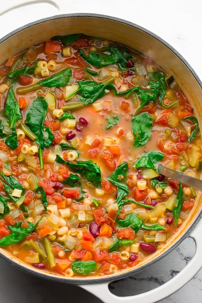 whole pot of minestrone soup, green spinach, white pot