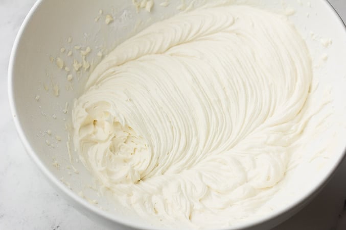 frosting in a white bowl