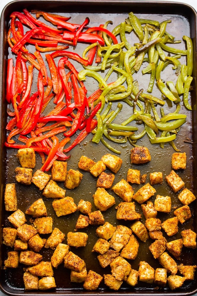 baked crispy tofu and peppers on a sheet pan