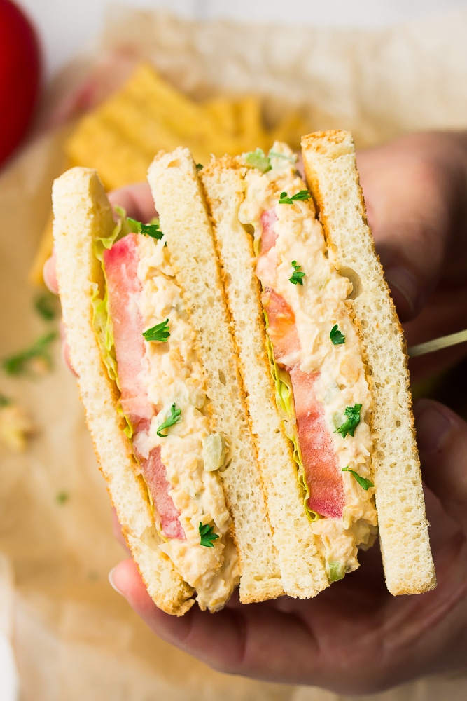 close up of a sandwich with mushy spread
