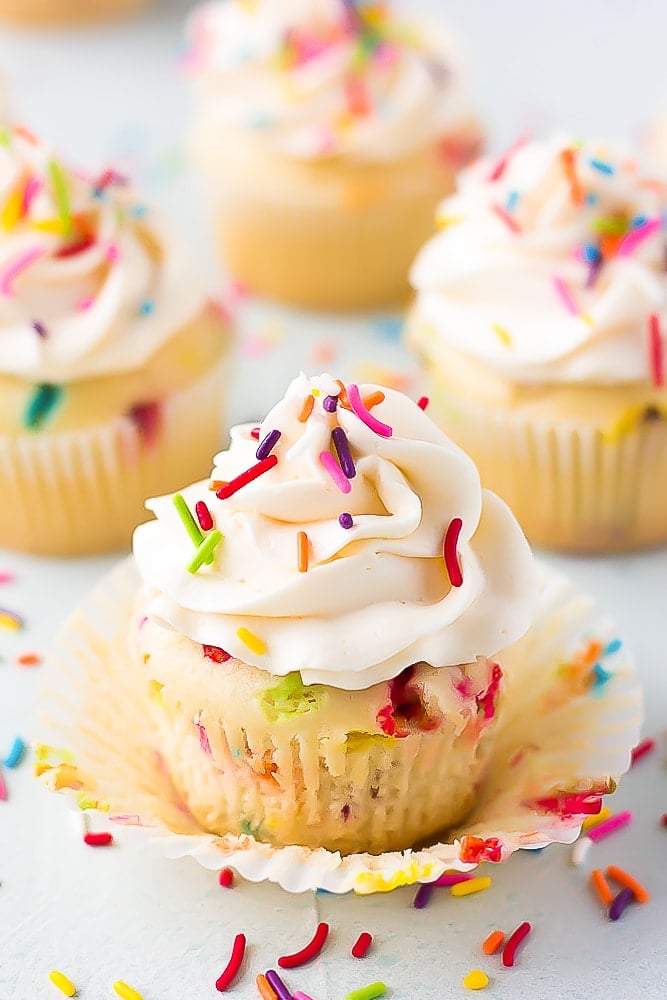 funfetti vegan cupcake with more in background