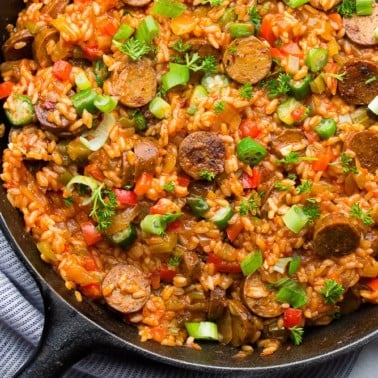 square image of pot of rice and vegetable dish