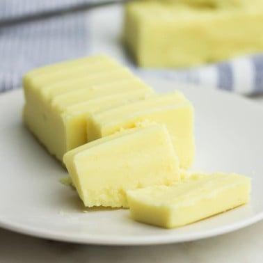 square image of butter being cut