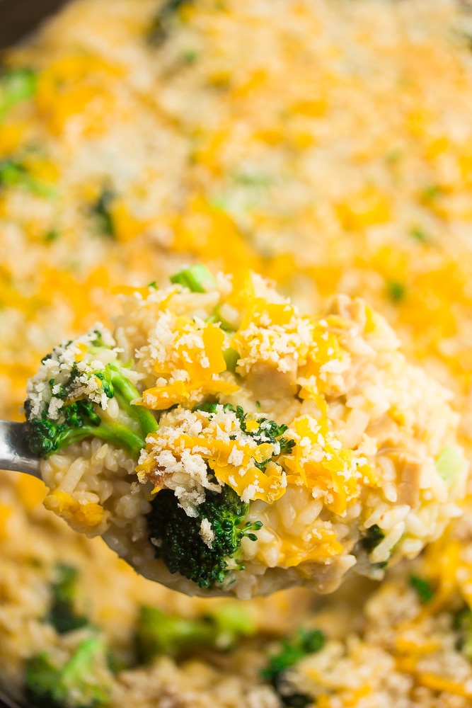 close up on a spoon full of chicken broccoli casserole