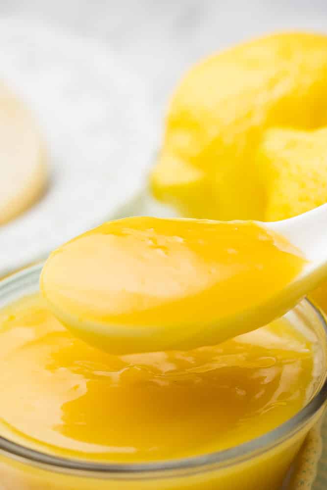 white spoonful of lemon curd
