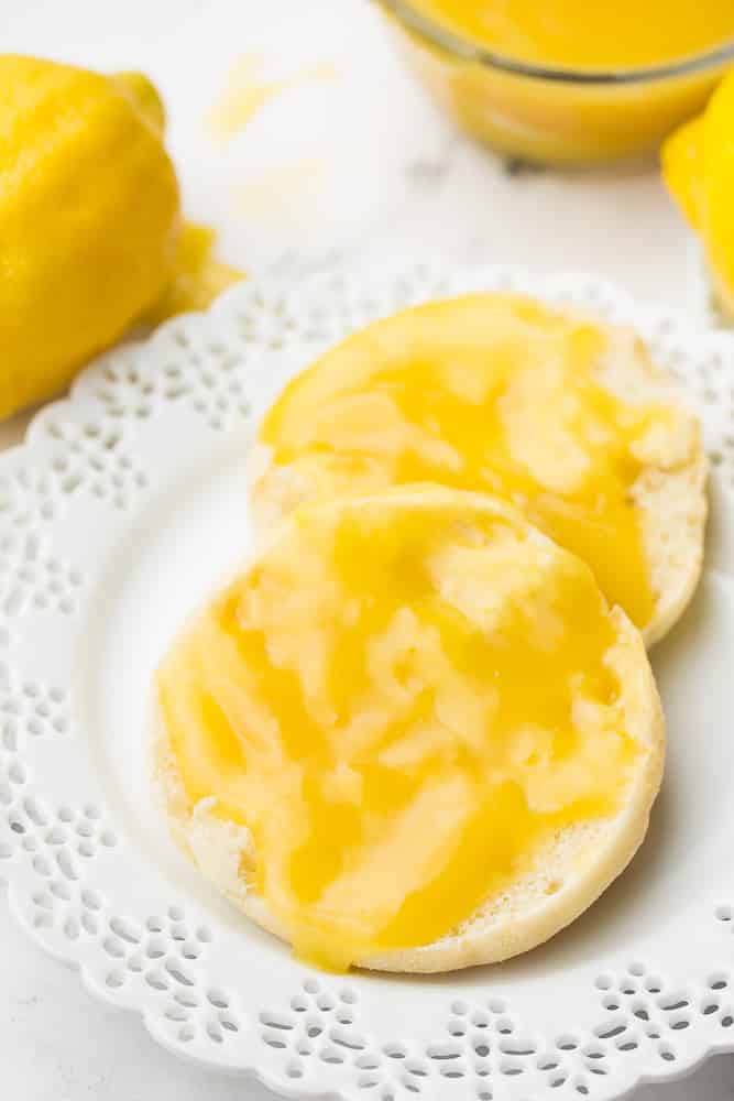 lemon filling on an english muffin, white plate