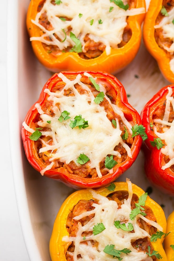 close up of a pepper with mixture and vegan cheese on top