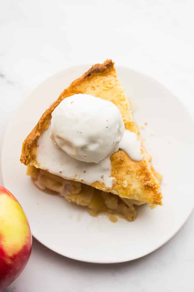 looking down on a piece of pie with ice cream on top