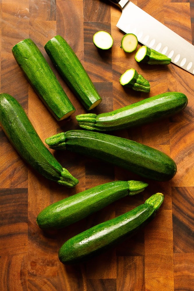 lots of zucchini on cutting board