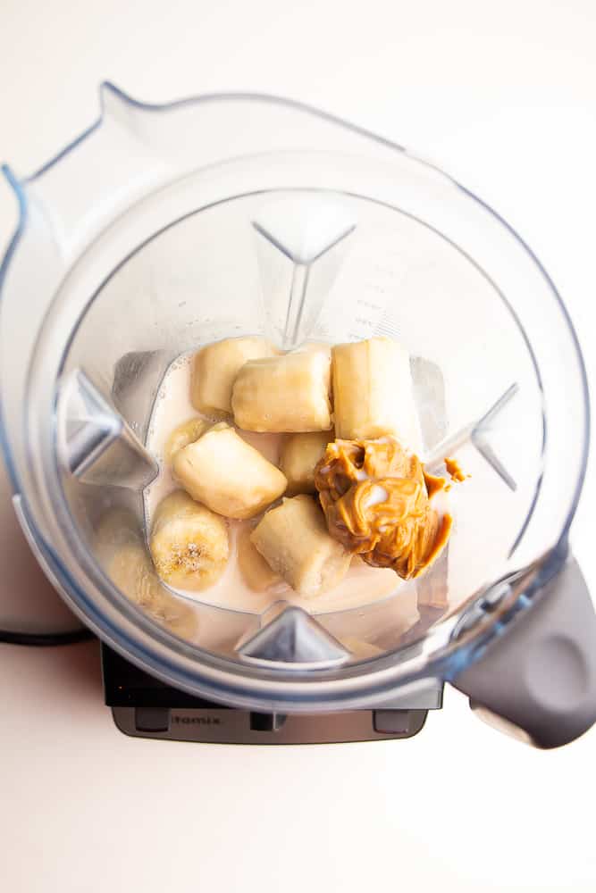 blender full of bananas and peanut butter