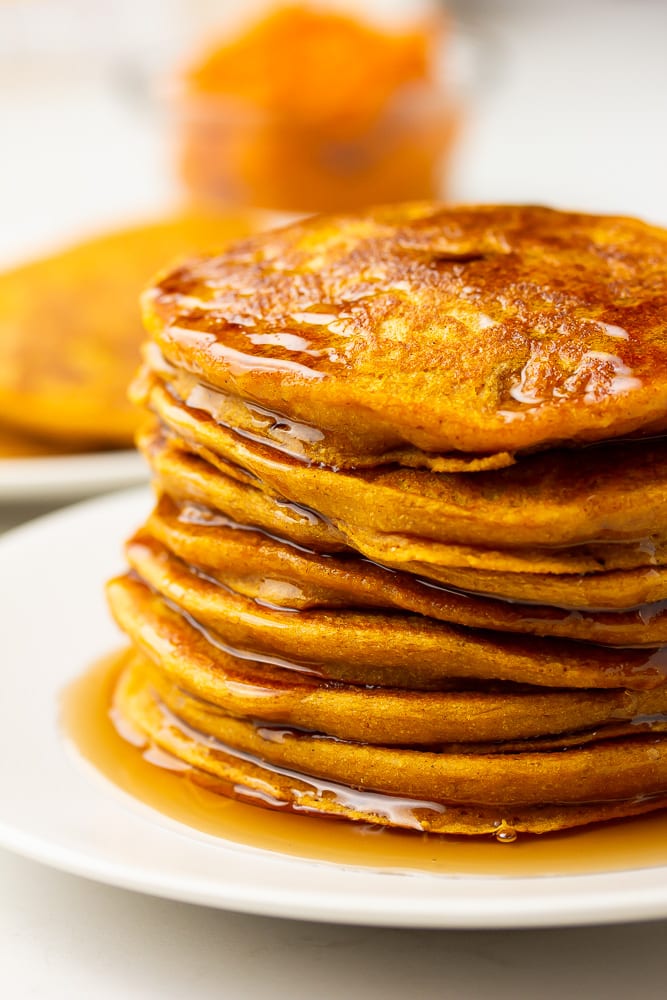 stack of pancakes on white plate