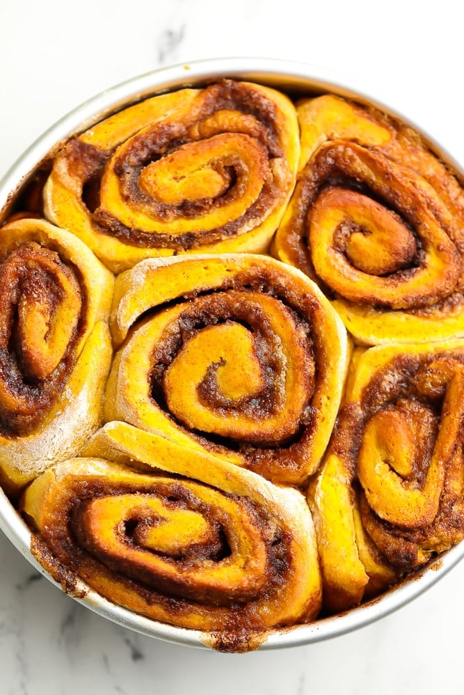 round dish of pumpkin cinnamon rolls, no icing