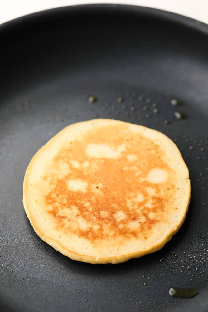 pancakes cooking on a pan