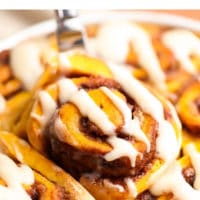 Pinterest image with text above photo of a cinnamon roll