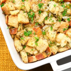 square image of stuffing in white casserole dish