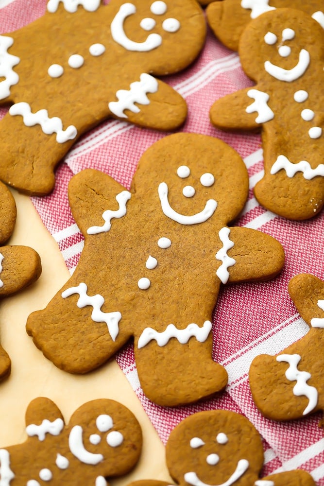 close up of a gingerbread cookie person, more around it