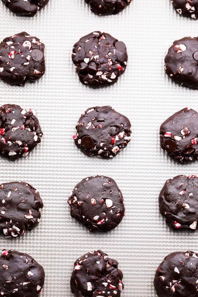 uncooked peppermint cookies on baking tray