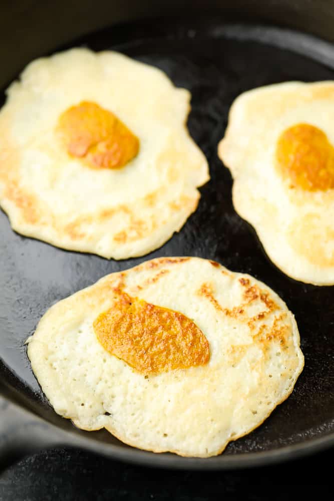 close up of cooked vegan eggs on a pan