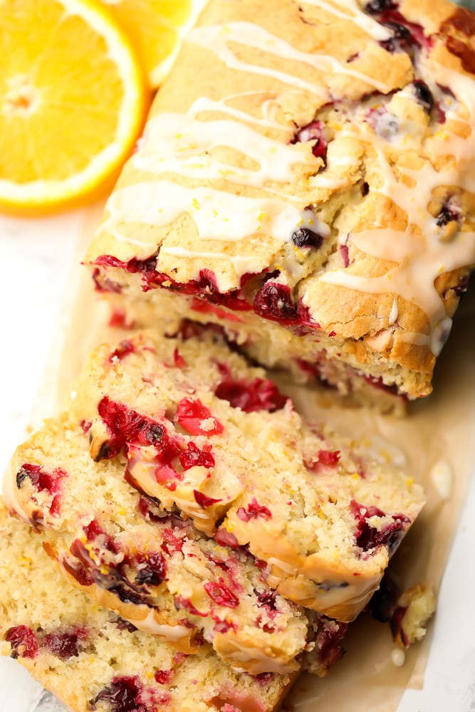 looking down on a loaf of bread with fruit and a glaze