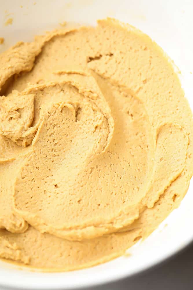 brown frosting in a bowl