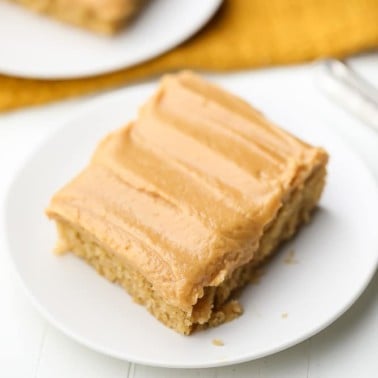 square image of a piece of cake on a white plate