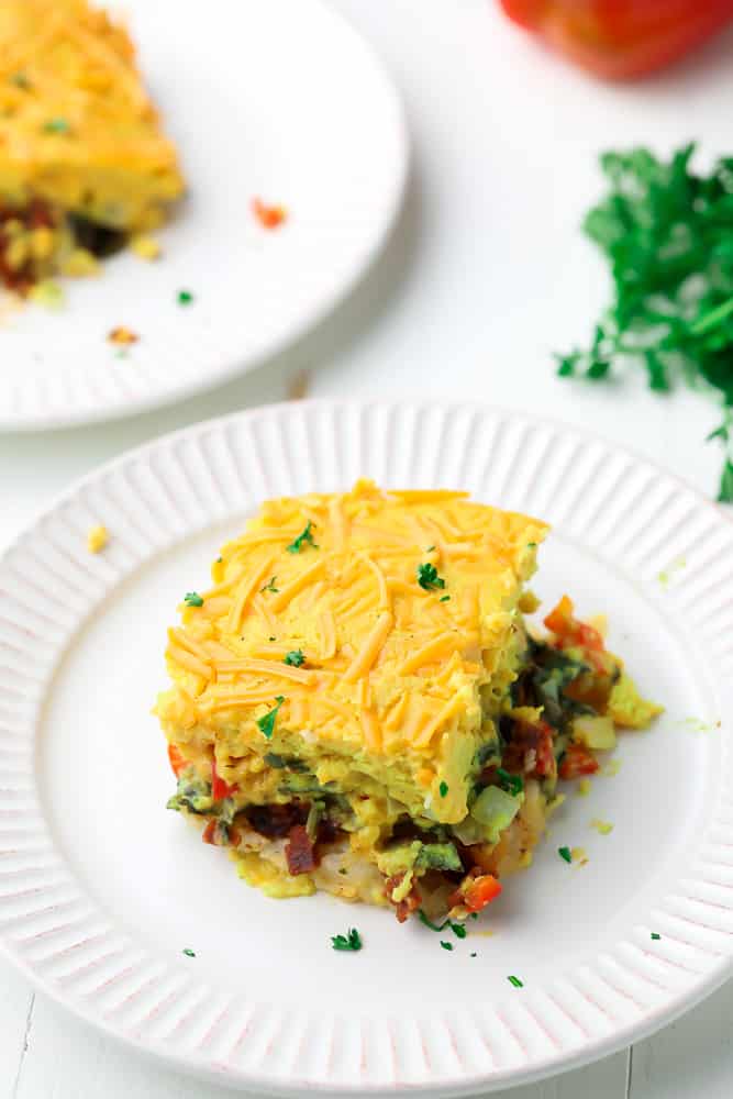 plate with a square of breakfast casserole on it