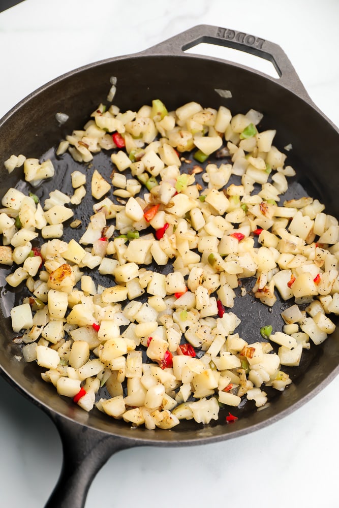 Frying potatoes in a cast iron pan