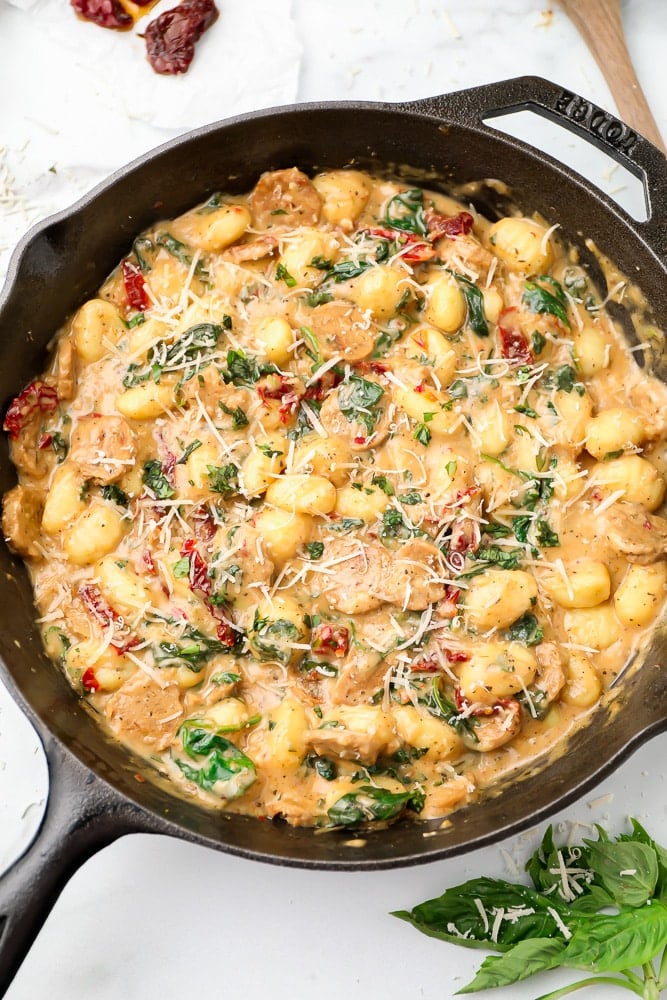 cast iron pan with gnocchi in it