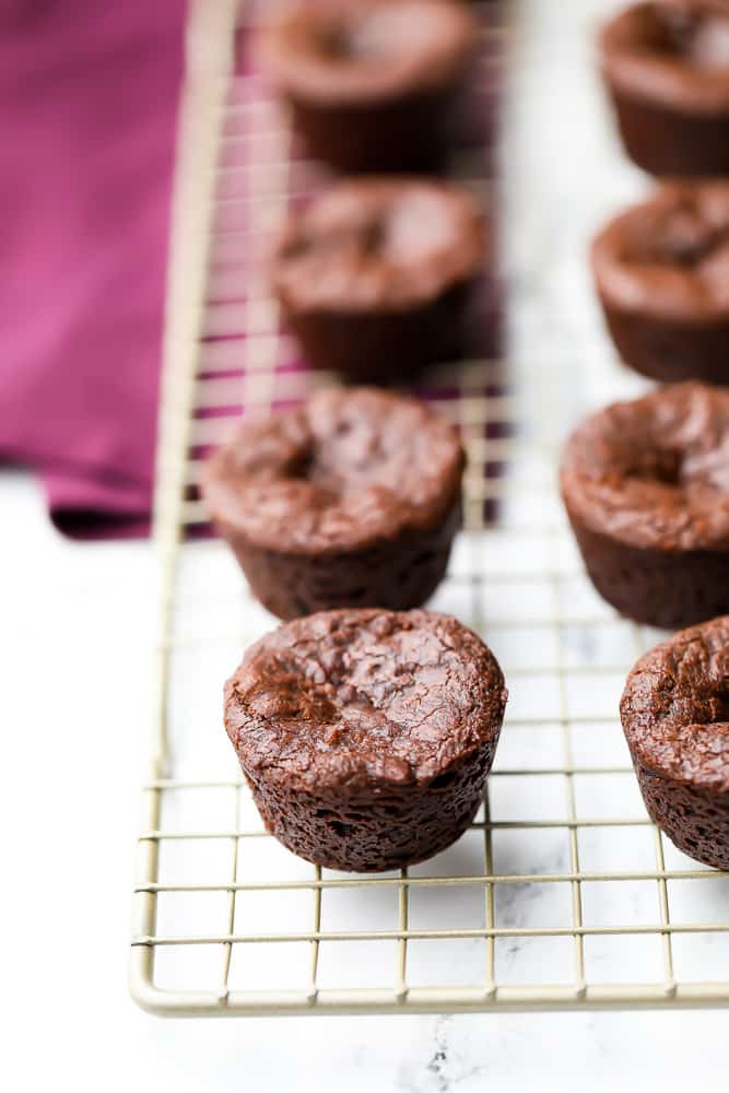 many brownie bites on a cooling rack