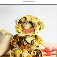 3 breakfast burritos cut in half and stacked on each other