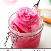 pinterest image of scooping pickled red onions out of a jar with a fork